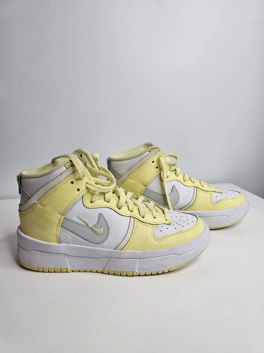 Nike Yellow & White Mid-Top Sneakers with Silver Swoosh